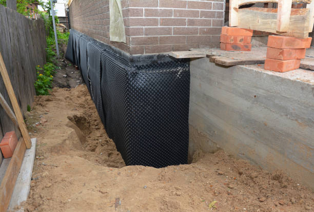 Happy homeowners after waterproofing job in Verona